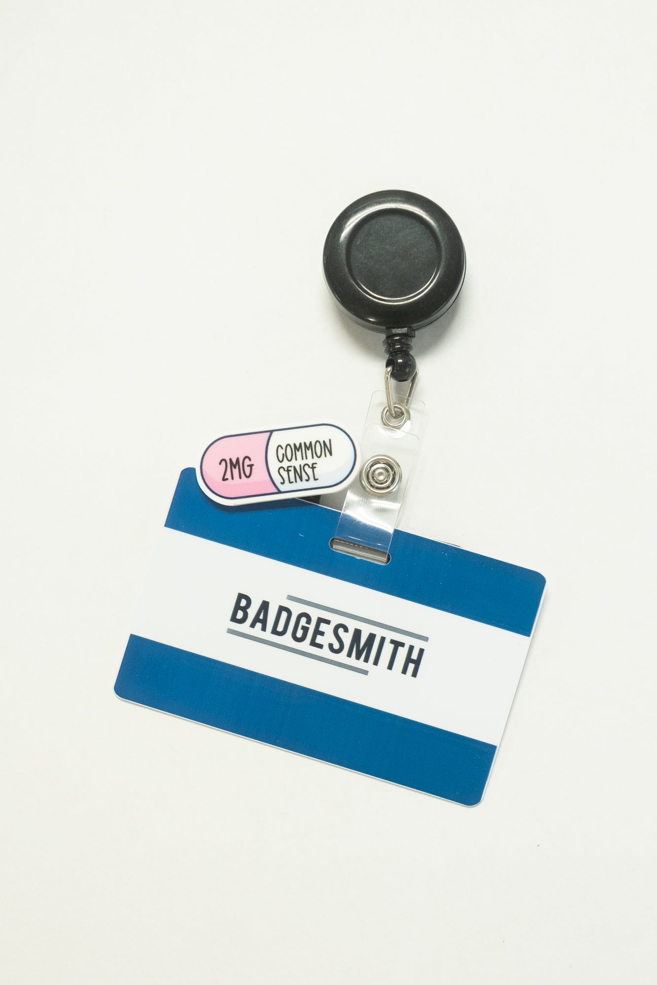 "2mg Common Sense" Pill Badge Charm - BadgeSmith