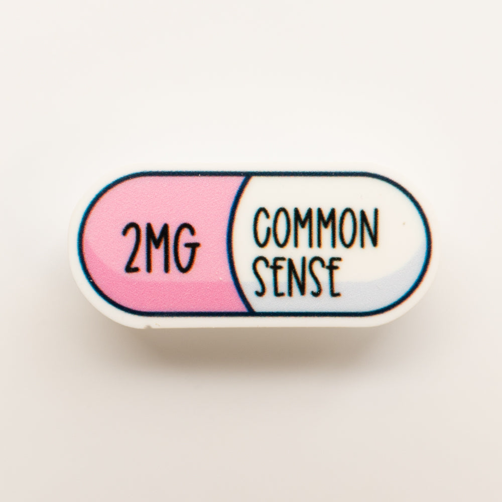 "2mg Common Sense" Pill Badge Charm