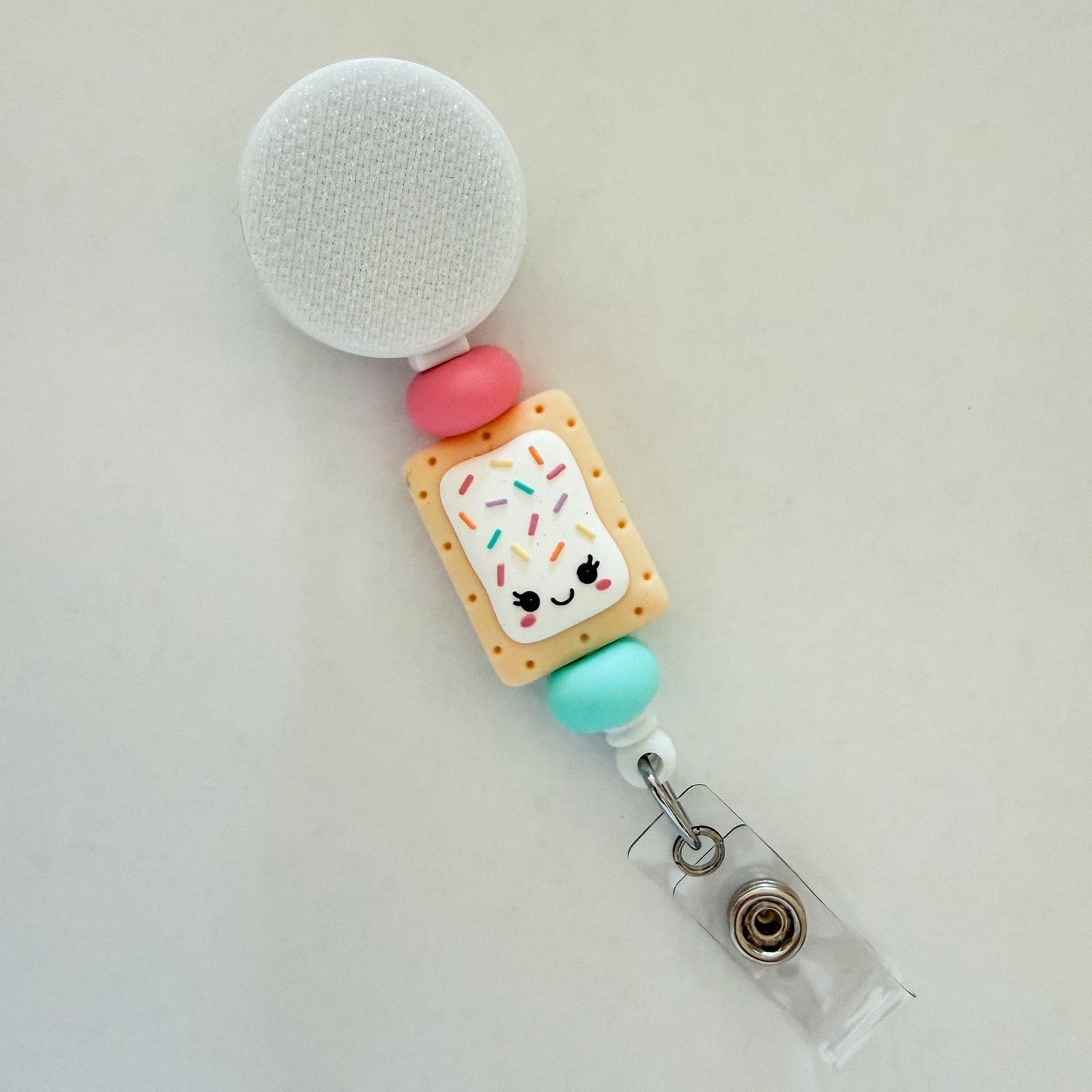 Pop Tart interchangeable badge reel with sprinkle pastry design for nurses and teachers