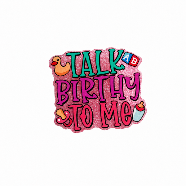Talk Birthy To Me plastic add-on featuring baby-themed icons, toy blocks, baby bottle, duck, and glitter design compatible with interchangeable badge reel bases for NICU nurses